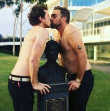 Harley and comedian mate David Quirk send a clear message outside the Margaret Court Arena. Celebrity Whisperer