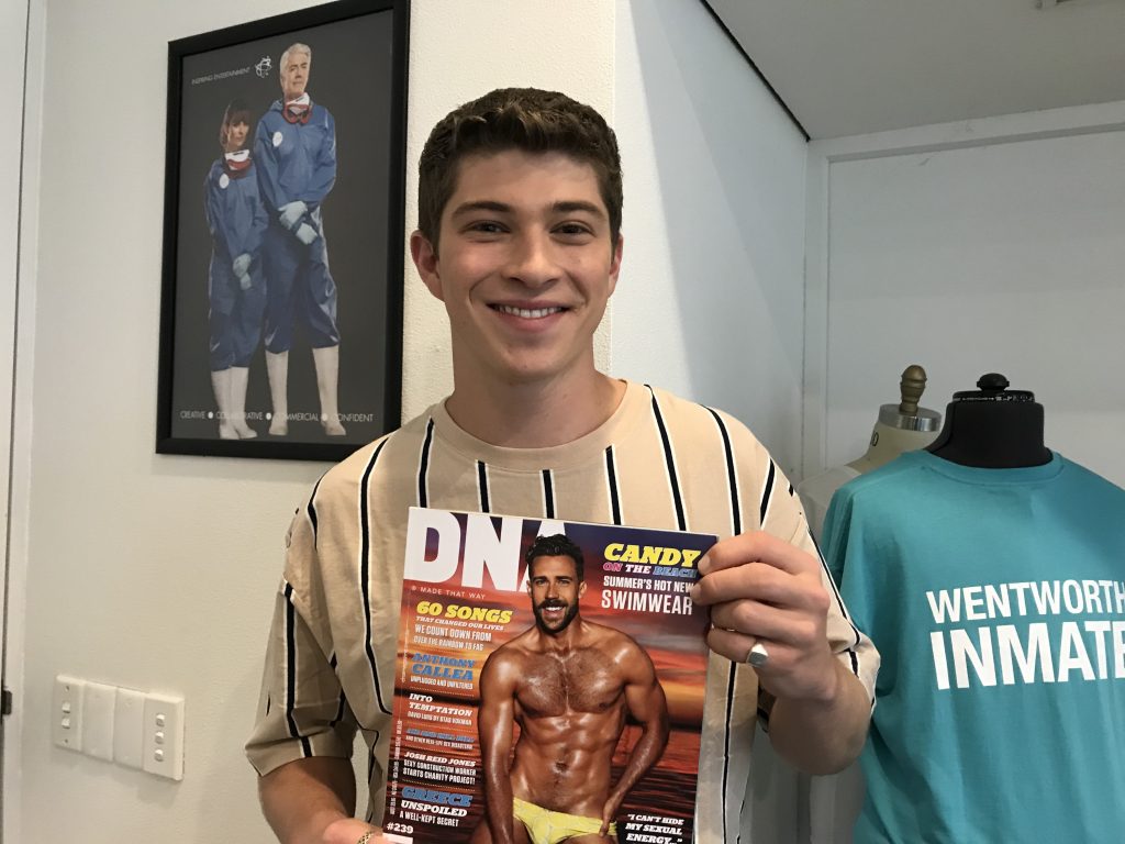 Benny looking at DNA Magazine. Matt Myers The Celebrity Whisperer