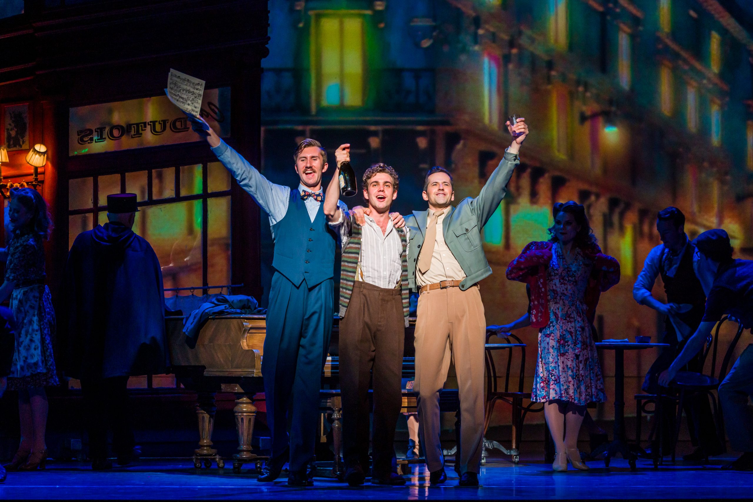 Sam Ward, with Robbie Fairchild and Jonathan Hickey in a scene from An American In Paris. Matt Myers The Celebrity Whisperer