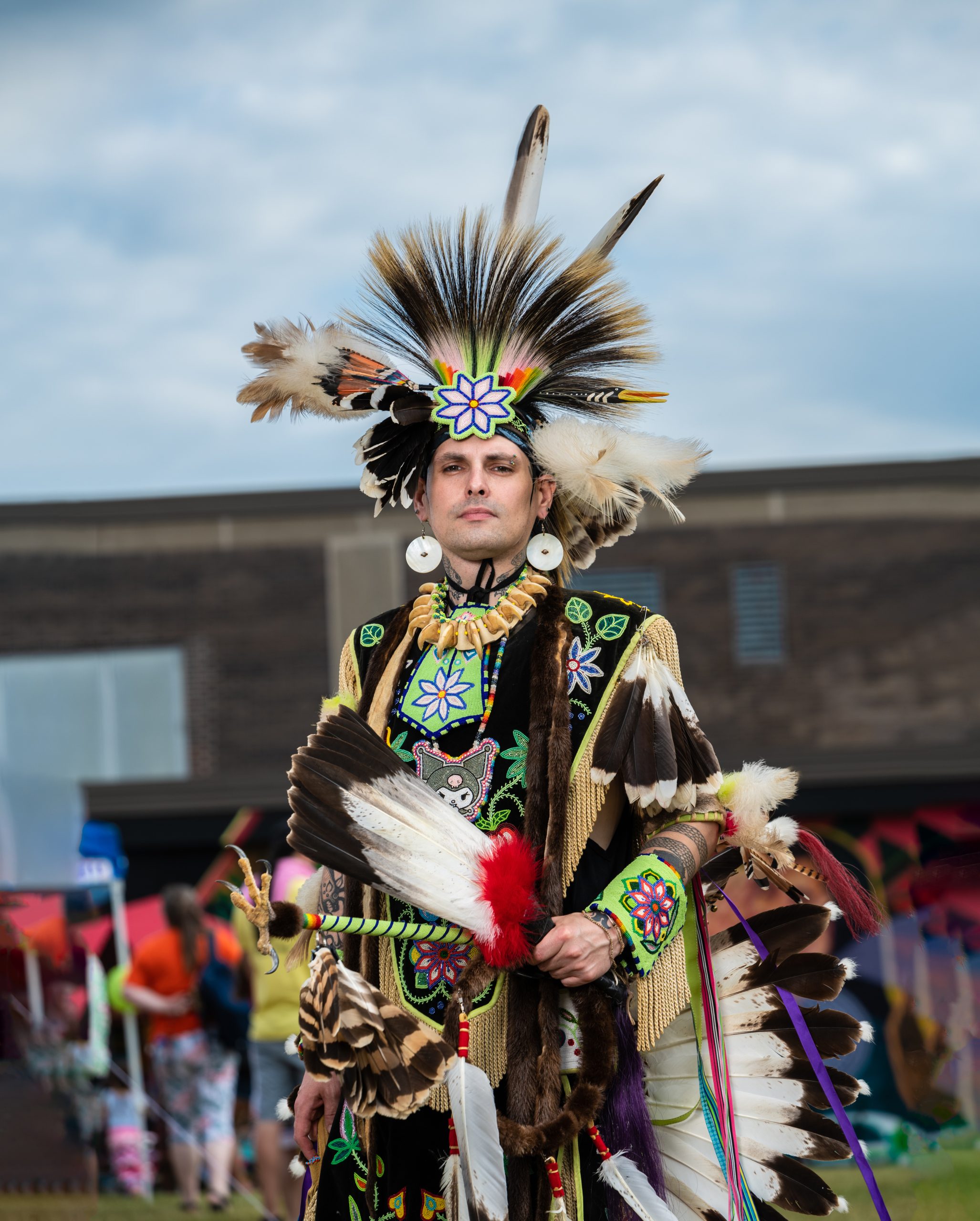 Ojibwe artist, Wayne Holmes, in regalia at the recent Two-Spirit powwow