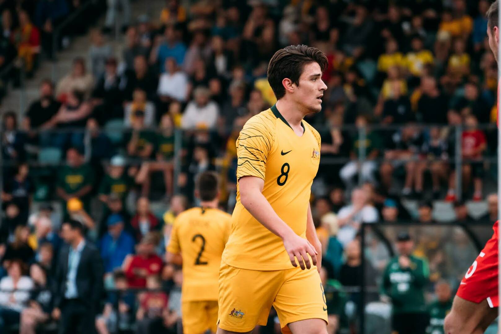 Matthew Hearne playing soccer with The Pararoos