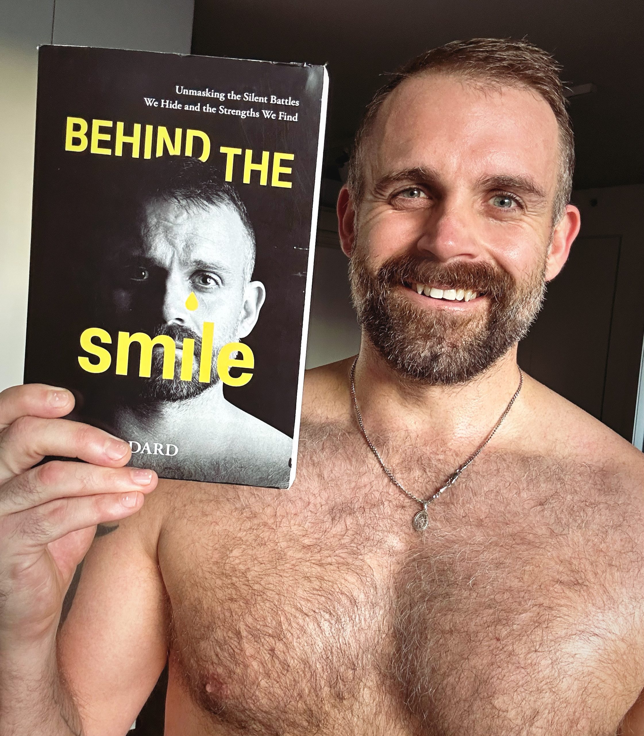 Chesty Rob getting behind his book Behind The Smile