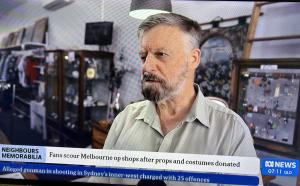 Unexpectedly being interviewed on the ABC News - having nabbed an historic Neighbours prop